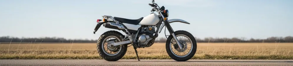 Ямаха Tw 200 вид сбоку бело-серый пластик