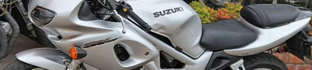 Suzuki SV 400s 2001 года серебристый с вмятинами на баке