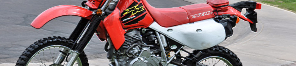 Тяжёлый ЭНДУРО-мотоцикл Honda XR650L вид сбоку